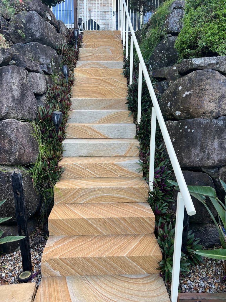 Wooden boardwalk between stone walls needing cleaning